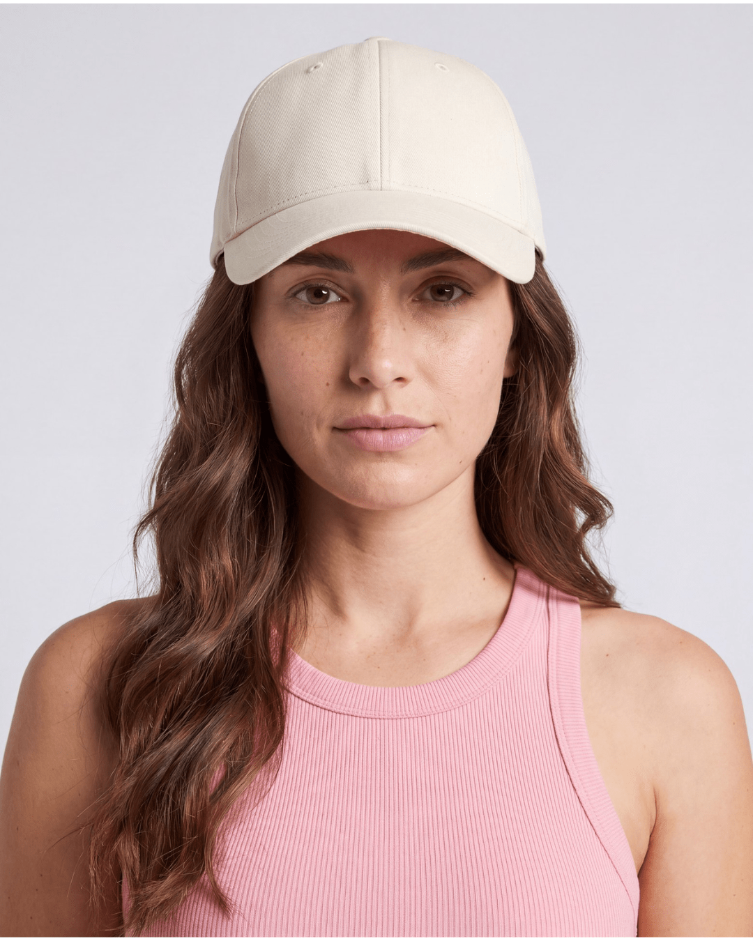 Cream cotton twill cap worn front on, soft unstructured crown and curved brim